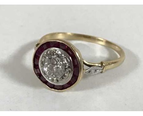 An Art Deco 18ct gold diamond and ruby set cluster ring