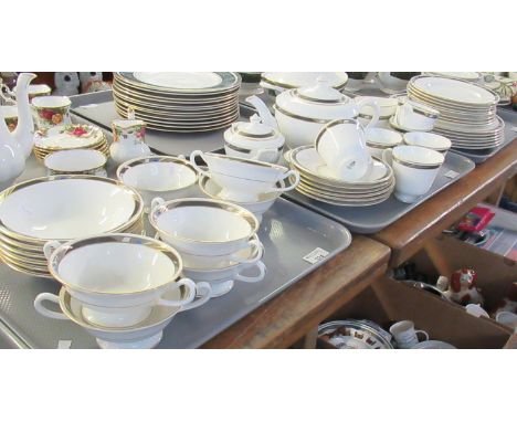 Three trays of Royal Doulton English fine bone china 'Raffles' design tea and dinnerware items to include; teapot, milk jug, 