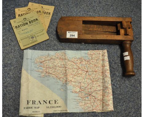 Vintage wooden football rattle marked W Clements & sons 1939, together with three Ministry of Food ration books and a fabric 