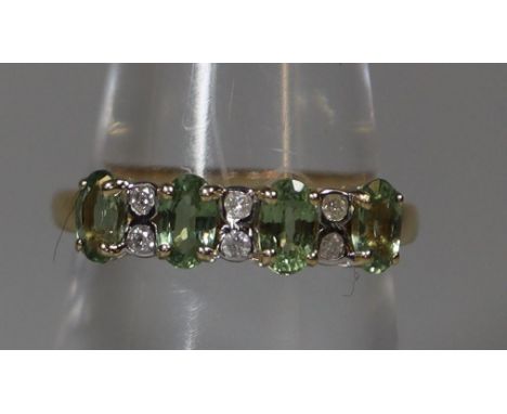 14ct gold diamond and green stone ring.  Ring size M&1/2.  Approx weight 2.4 grams.(B.P. 21% + VAT) 