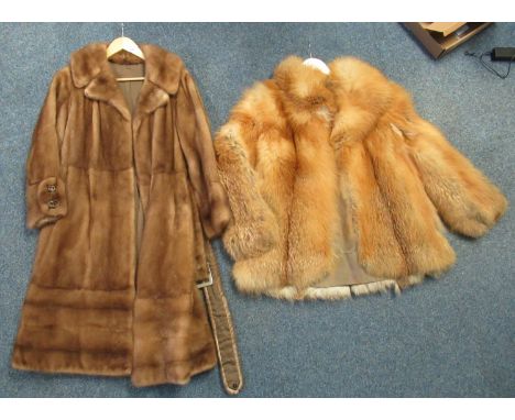 Two vintage fur items; a brown mink fur coat with belt and square button detail to cuffs, together with a red fox fur jacket.