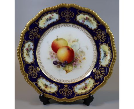 Royal Worcester porcelain cabinet plate hand painted with fruits and foliage with cobalt blue border and gilt foliate decorat