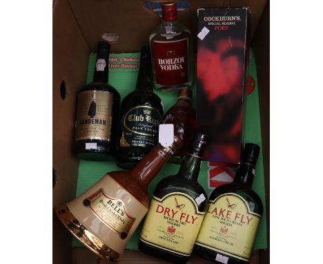 Box containing assorted alcohol to include; two lake fly fine rich cream sherry, Wade Bell's Scotch whisky decanter, Sandeman