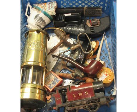 Plastic box of assorted items to include brass minors lamp marked Cymru with Welsh dragon. Vintage cork screws, pipe, LMS tin
