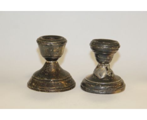 A MATCHED PAIR OF HALLMARKED SILVER SQUAT CANDLESTICK A/F