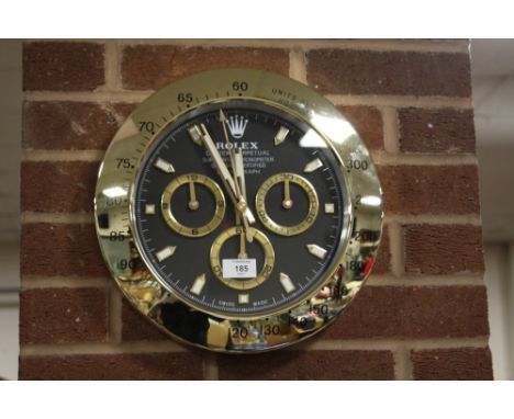 A ROLEX OYSTER PERPETUAL COSMOGRAPH WALL CLOCK WITH SWEEPER HAND WIDTH 34CM  