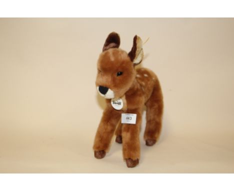A STEIFF DEER SOFT TOY WITH LABEL IN EAR