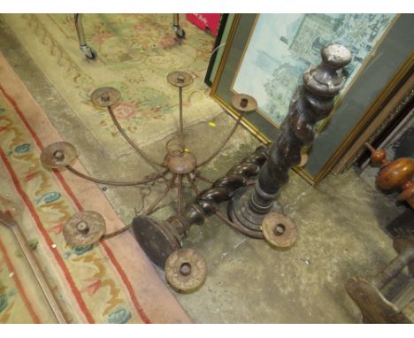 A PAIR OF VINTAGE LARGE OAK BARLEYTWIST CANDLESTICKS H-57 CM AND A IRON LIGHT FITTING (2)