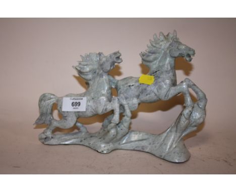  A GREEN JADE COLOURED MARBLE CARVED FIGURE OF HORSES A/F