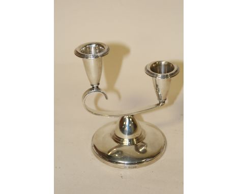 A HALLMARKED SILVER DUAL BRANCH CANDLESTICK 