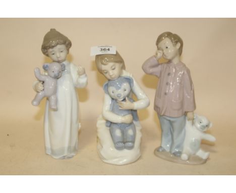 THREE NAO FIGURES OF YOUNG BOYS WITH TEDDY BEARS 