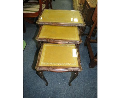 A HEAVY OAK DROPLEAF TABLE WITH AN OAK FRAMED FIRESCREEN AND A GLASS TOPED NEST OF TABLES (3)