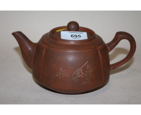 AN ORIENTAL TYPE TERRACOTTA TEAPOT, W 19 CM