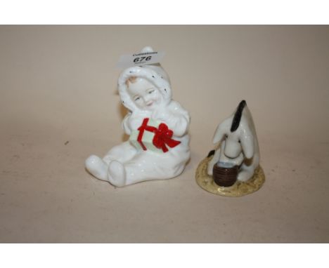 A ROYAL DOULTON WINNIE THE POOH COLLECTION 'EEYORE'S BIRTHDAY' FIGURE TOGETHER WITH A ROYAL DOULTON BABY'S FIRST BIRTHDAY FIG