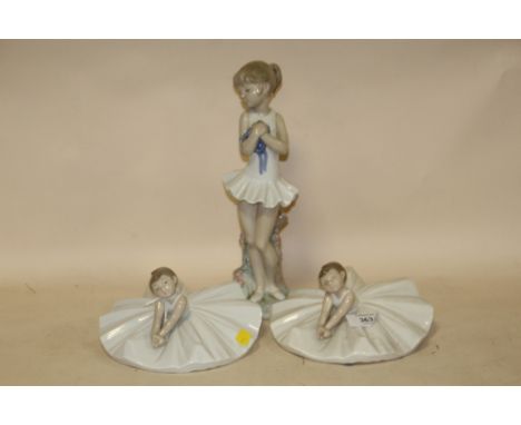 TWO NAO SEATED BALLERINA FIGURES TOGETHER WITH A LARGE NAO BALLERINA GIRL FIGURE, TALLEST 29 CM (3)