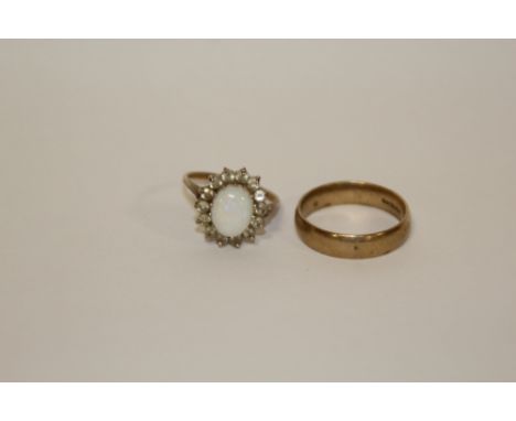 A HALLMARKED 9 CARAT GOLD WEDDING BAND, TOGETHER WITH A 9 CARAT GOLD OPAL SET DRESS RING  APPROX WEIGHT - 6.9G