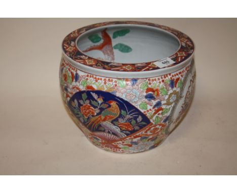 AN ORIENTAL CERAMIC FISH BOWL WITH CHARACTER MARKS TO BASE A/F