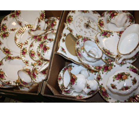 FOUR TRAYS OF ROYAL ALBERT OLD COUNTRY ROSES CHINA TO INCLUDE CUPS AND SAUCERS, CLOCK, PICTURE FRAME, FRUIT BOWL ETC. 