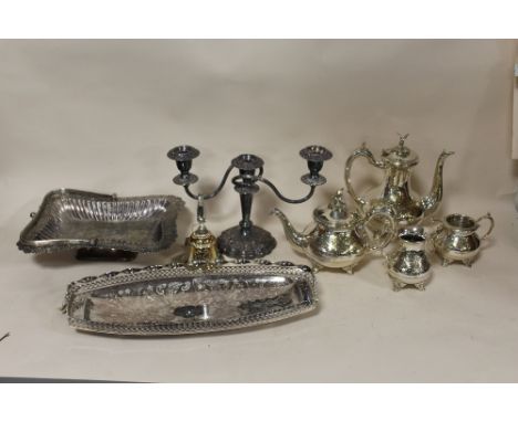 A BOX OF SILVER PLATED METALWARE TO INCLUDE A TEA SERVICE, CANDELABRA ETC.