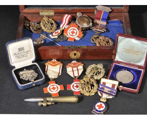 *Royal Flying Corps. A collection of five RFC cap badges,  three collar badges plus a silver and enamel RFC badge, trench art