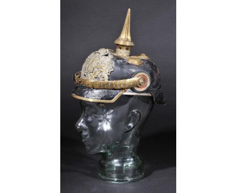 *Picklehaube. A WWI Bavarian issue helmet,  with black leather skull, brass helmet plate, spike and chin scales and cockades,