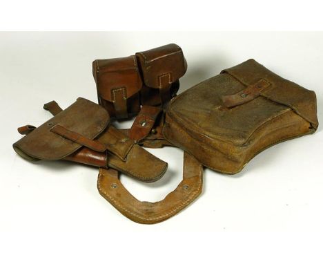 *WWII Germany Army leather accoutrements. A pistol holder, a map pouch, a pair of magazine holders and another,  all in good 