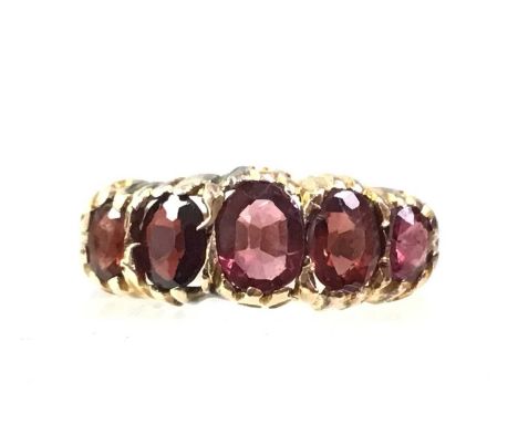 GARNET FIVE STONE RING, NINE CARAT GOLD  size K 1/2Qty: 1.2g