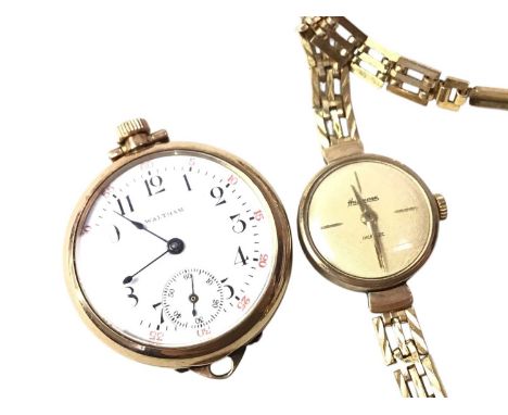 LADY'S GOLD CASED WRIST WATCH, ALONG WITH A WALTHAM FOB WATCH the watch cased in nine carat gold on gilt bracelet, along with