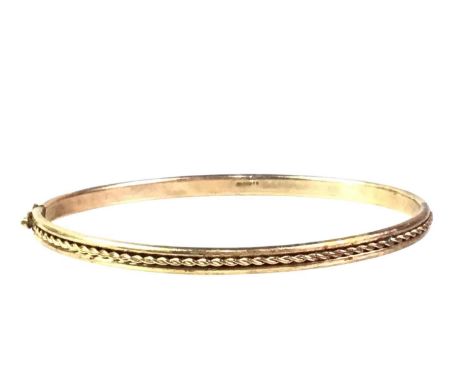 BANGLE AND FINE CHAINS, NINE CARAT GOLD the bangle with rope twist design, along with two chains, one brokenQty: 8.90g gross