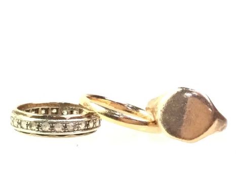 TWO NINE CARAT GOLD RINGS, AND OTHER ITEMS comprising a wedding band and a signet ring, along with a locket, a stick pin set 