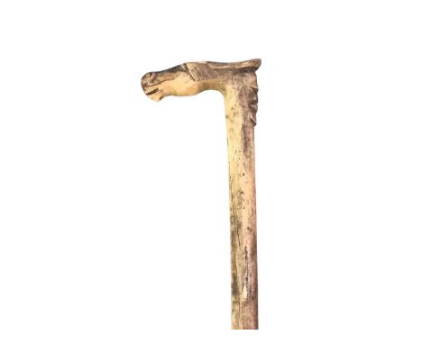 VINTAGE WOODEN WALKING STICK, the handle carved depicting a horse head, with a man's face to the rear of the handle83cm long