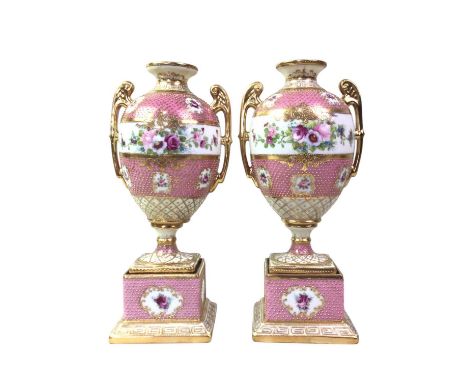 PAIR OF NORITAKE VASES, each modelled as urns, raised on square bases, marked to bases25.5cm high 