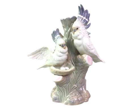 SPANISH POTTERY VASE, ALONG WITH MODELS OF BIRDS  the vase modelled with a pair of cockatoos, stamped Miguel Requena mark, th