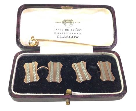 PAIR OF CUFFLINKS, NINE CARAT GOLD with engine turned decoration, along with a nine carat gold stick pinQty: 7g