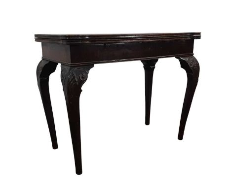 VICTORIAN MAHOGANY TURNOVER CARD TABLE, with carved legs61cm x 76cm 