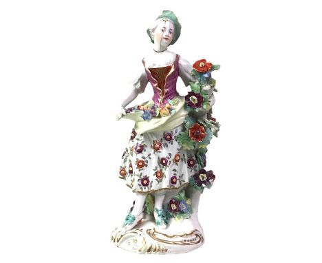 ENGLISH PORCELAIN FIGURE OF A FRUIT SELLER, ALONG WITH A DERBY FIGURE OF A BOY the first likely Bowthe first 24cm highQty: 2