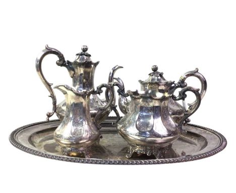 VICTORIAN PLATED FOUR PIECE TEA AND COFFEE SERVICE of octagonal vase shape with an associated oval tea trayQty: 5
