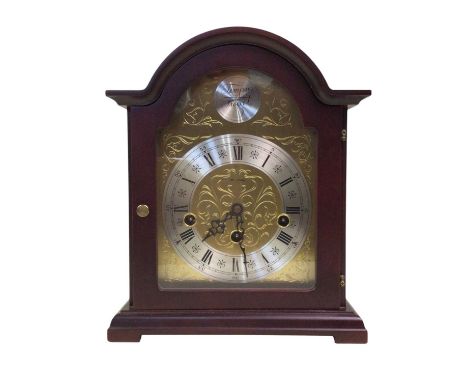 REPRODUCTION MANTEL CLOCK, AND TWO PARAFFIN LAMPS the clock face marked 'Tempus Fugit', the silvered dial with outer seconds 