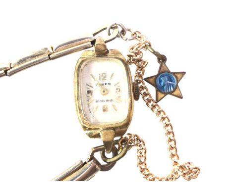 VINTAGE WRIST WATCH, NINE CARAT GOLD manual wind movement in a gold cushion shaped case and on an expanding bracelet, along w
