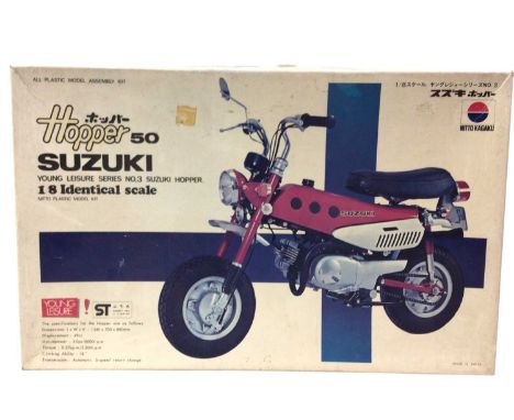 FIVE VINTAGE MODEL KITS, TAMIYA AND FURTHER comprising a Nitto Kagaku Hopper 50, a Tamiya Honda CX500 Turbo, a Tamiya BMW K10