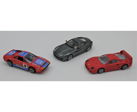 COLLECTION OF THREE FERRARI SCALE MODELS Ferrari 308 GTB rally car by Burago to 1:43 scale Ferrari 599 GTB to 1:43 scale  Fer