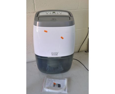 AN EASY HOME LE 2014 DEHUMIDIFIER with manual (PAT pass and working) (water tray has burn mark to top right)