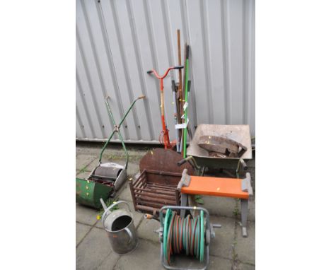 A RANSOMES PUSH ALONG LAWN MOWER, a Fire Basket, a wheel Barrow and various garden tools including an Auto spade