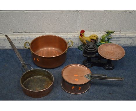 A COLLECTION OF COPPERWARE to include a jam pan with twin brass handles, a balance scale with weights, pan with lid, another 