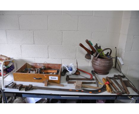 A TRAY AND A CAULDRON CONTAINING HANDTOOLS including a 3ft long unbranded sash cramp, various hammers of different styles, fi