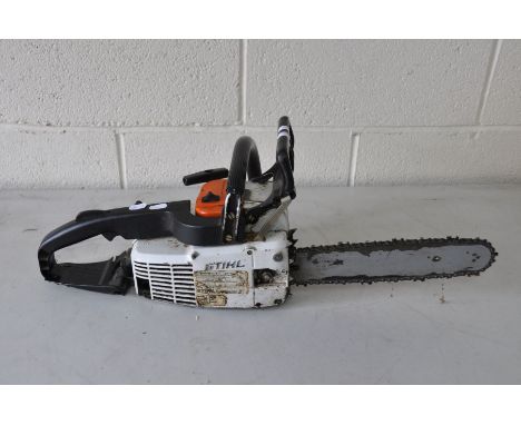 A VINTAGE STIHL 011AV PETROL CHAINSAW with blade protrusion of 11ins (engine tight to pull but no fuel so hasn't been started