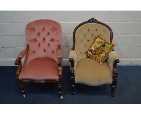 A VICTORIAN WALNUT UPHOLSTERED BUTTON BACK ARMCHAIR, with scrolled arm rest, on turned legs and front casters (back casters m