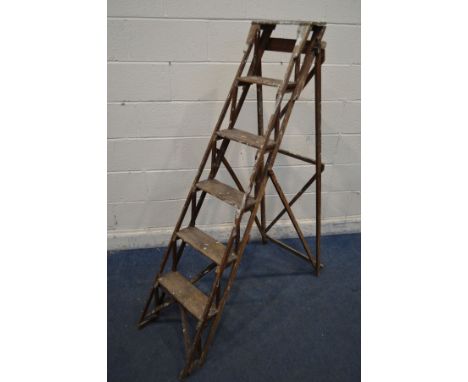 AN EARLY 20TH CENTURY FIVE RUNG STEP LADDER, similar to a Hatherley Lattistep, height 152cm (works as should, paint splashes 