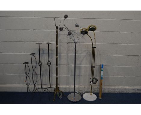 TWO DECORATIVE MODERN FLOOR STANDING LIGHTS, along with a brass standard lamp, four metal candle stands and a brand new vinyl