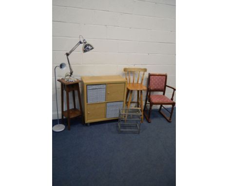 A MODERN BEECH STORAGE UNIT with two cupboard doors and fabric tubs, together with an oak plant stand, beech high chair, maho